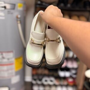 Elegant Cream Platforms with Gold Accent
